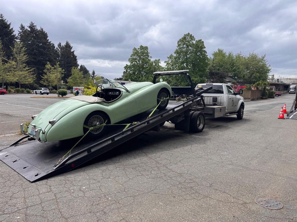 Green classic roadster on a lowered Rapid Roadside Runner flatbed