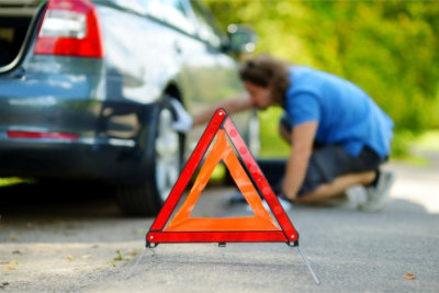 fixing the car along the road